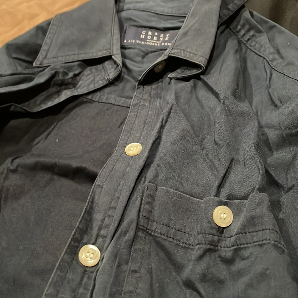 2/$20. Bundle of 2 women’s top. Size medium.
